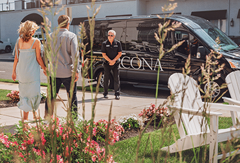 Couple walking towards the ICONA shuttle