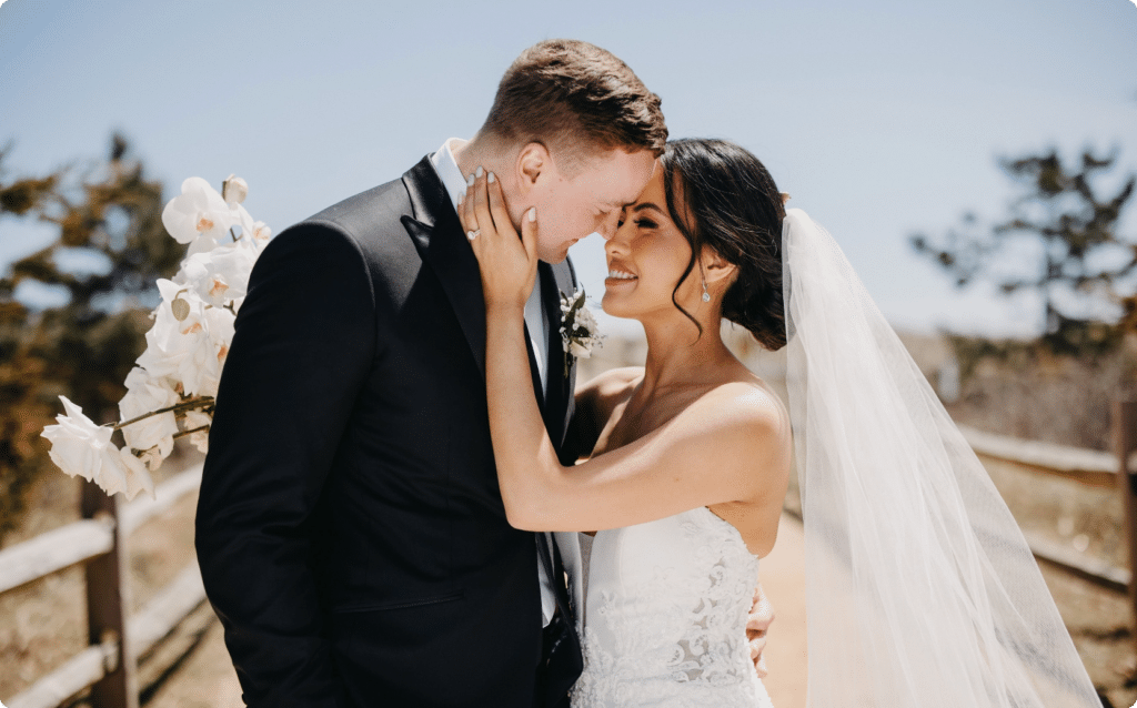 Couple with their foreheads pressed together at a NJ beach wedding