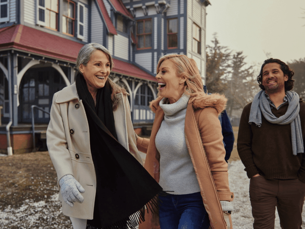 Friends walking through Cape May in the winter