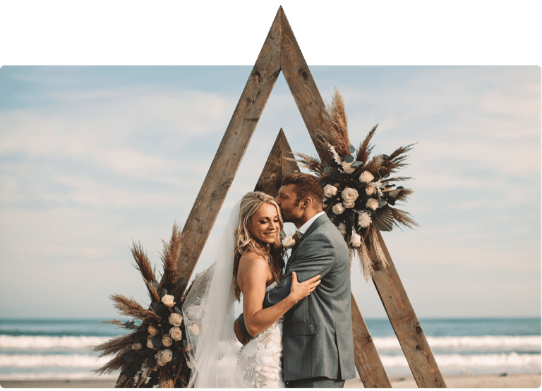 Bride and groom kissing at a Cape May wedding