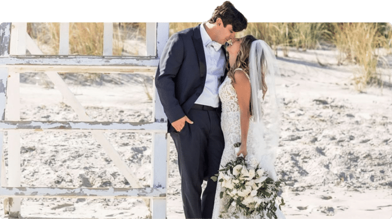 Bride and groom about to kiss on Avalon Beach in front of ICONA Avalon