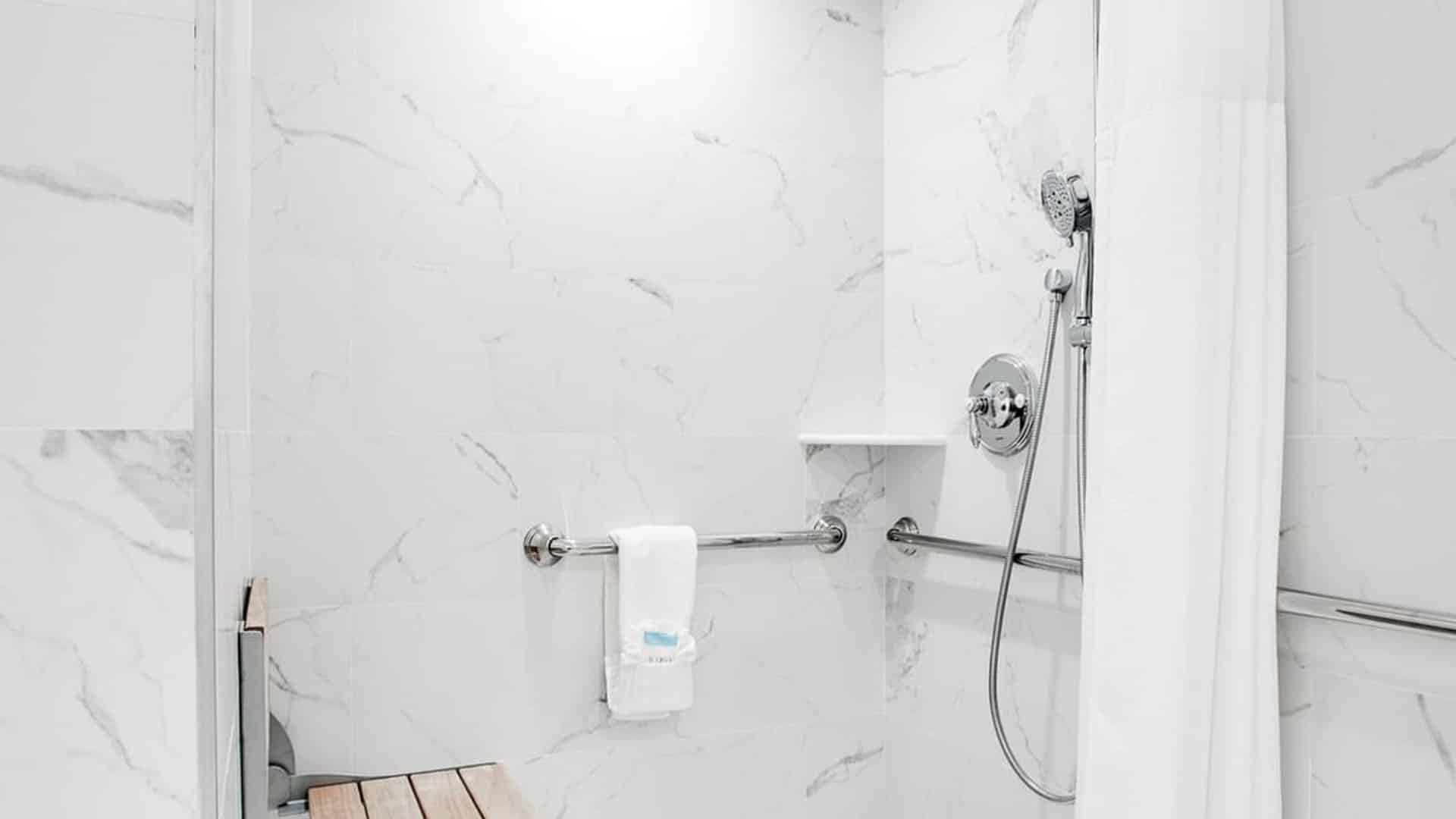 ICONA Windrift signature king studio ADA hotel room shower