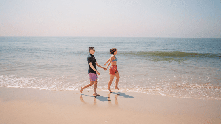 Couple walking on the beach