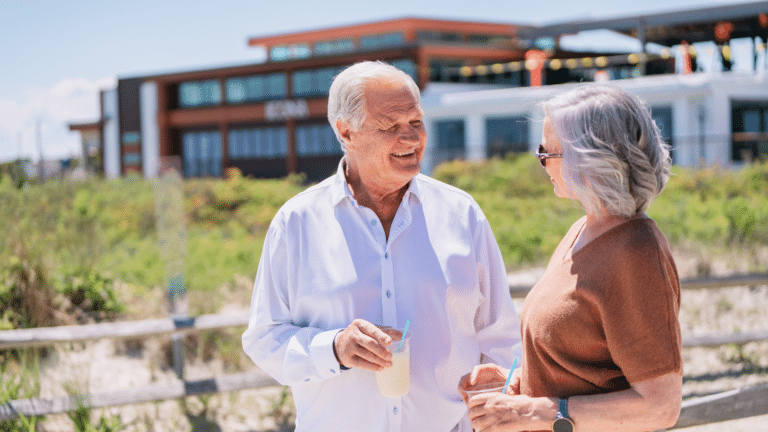 Older couple outside of a romantic resort